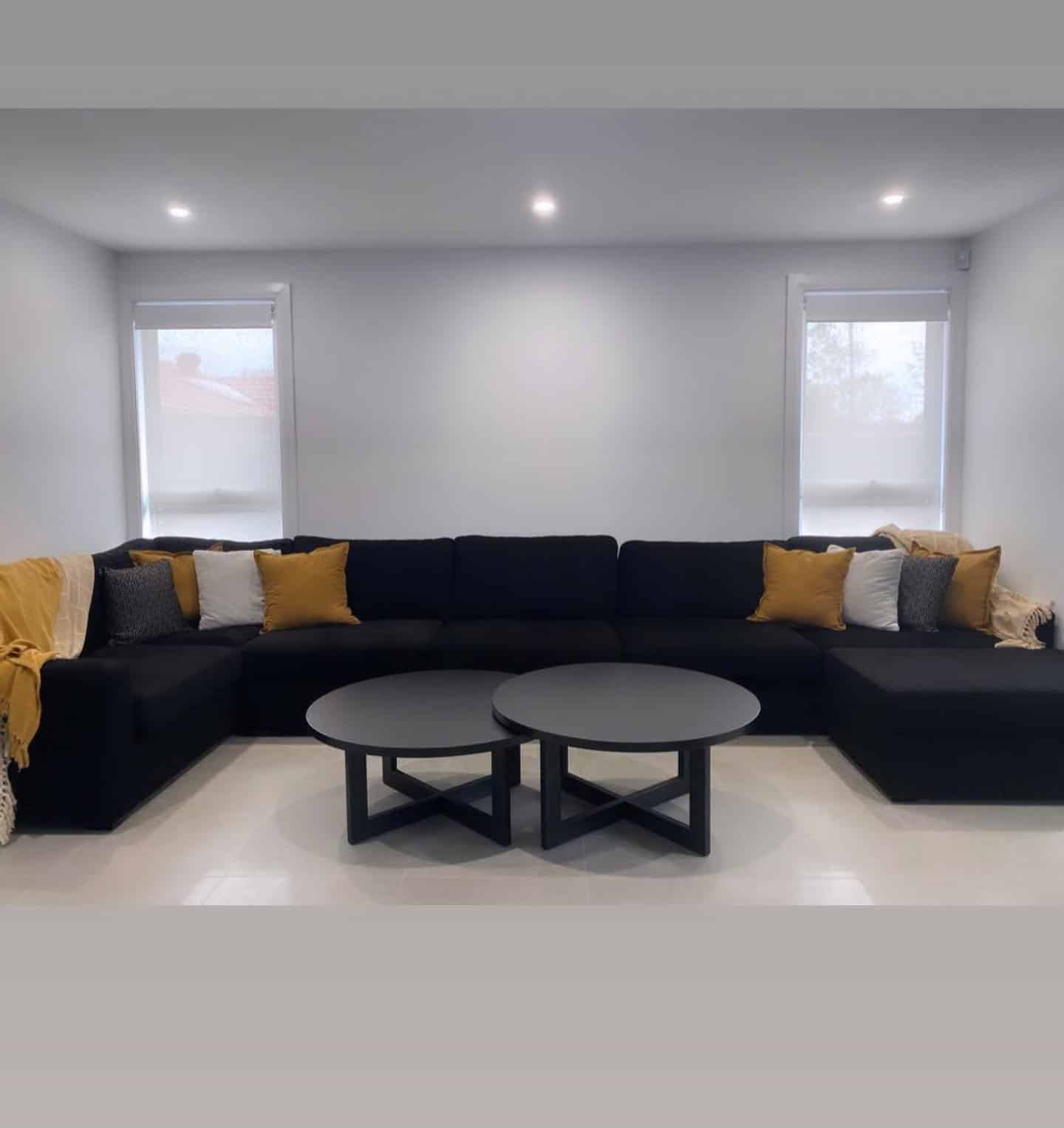 8. Contemporary Comfort in Monochrome - black and cream living room ideas