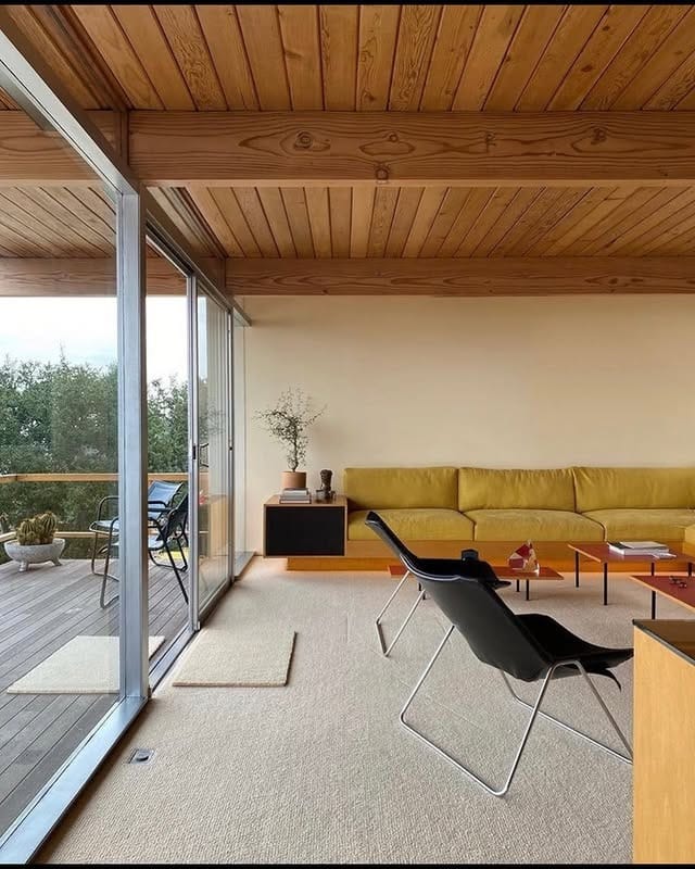 18. Retro Modern with Warm Contrast - black and cream living room ideas