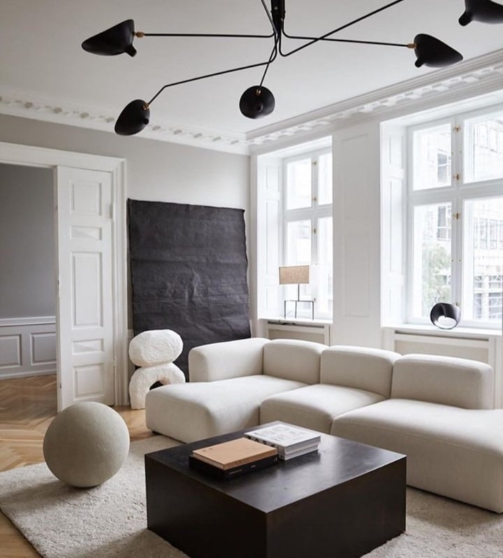 20. Monochrome Sculptural Modernism - black and cream living room ideas