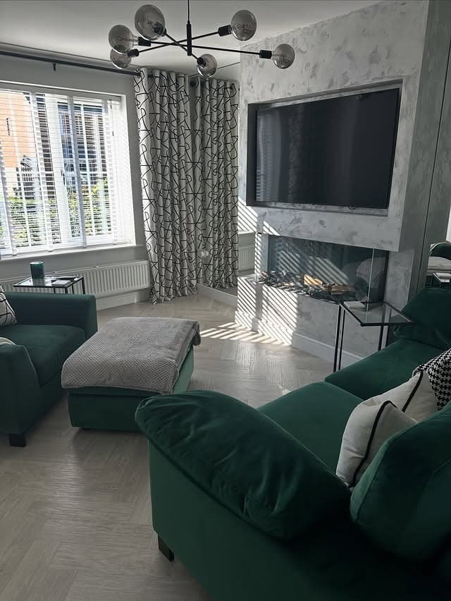 3. Emerald Modern Luxe - aesthetic living room ideas