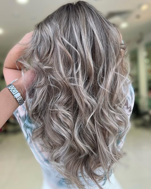 9. Ash Champagne Curls - Ash Blonde Hair Color