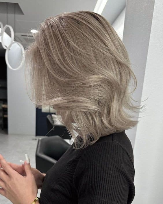19. Polished Cool Ash Mid-Length Cut - Ash Blonde Hair Color