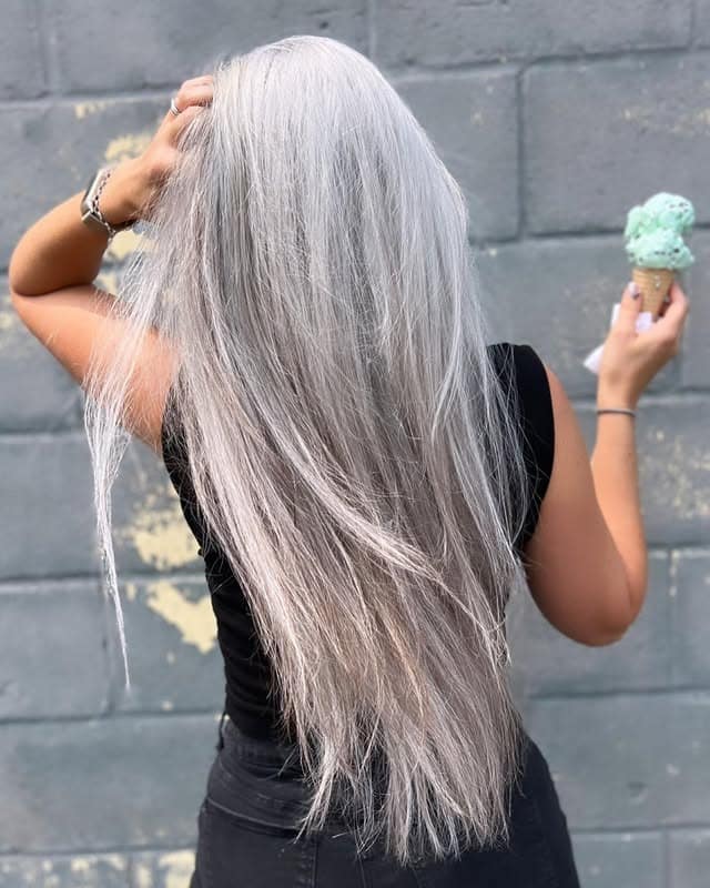 1. Icy Silver Sleek Layers - Silver Hair Color