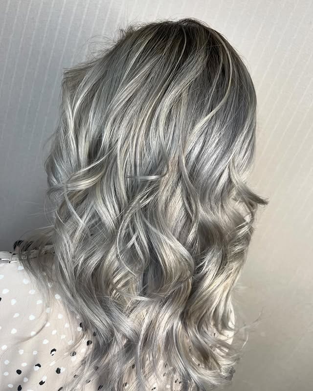 8. Smoky Platinum Waves - Silver Hair Color