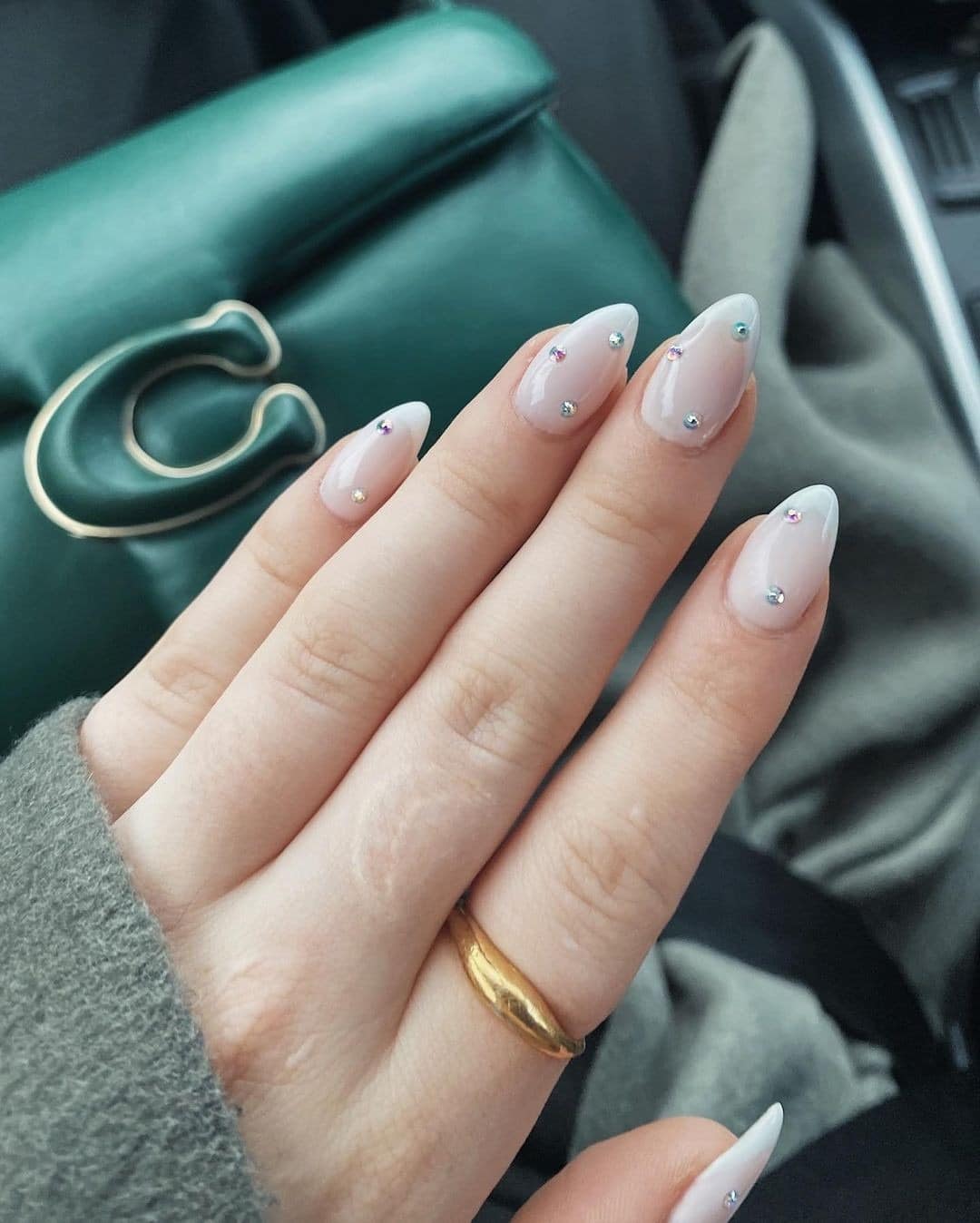 2. Minimal Crystal Almond Nails - iridescent nail ideas