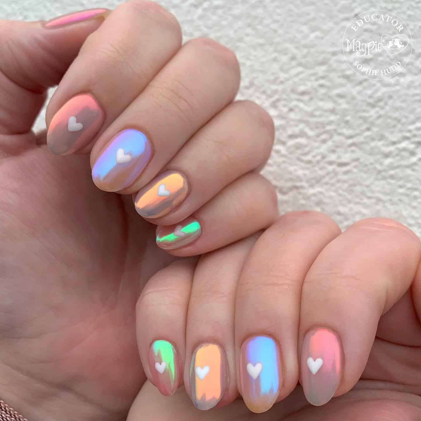 8. Pastel Chrome Heart Nails - iridescent nail ideas