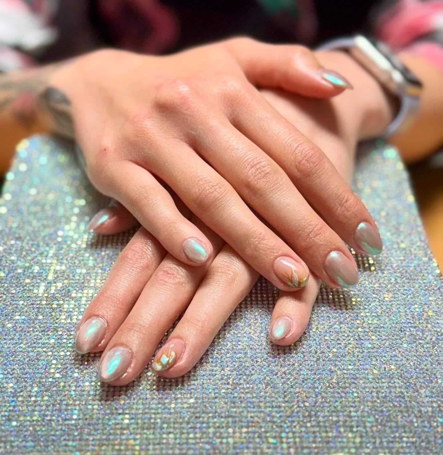 13. Iridescent Confetti Almond Nails - iridescent nail ideas