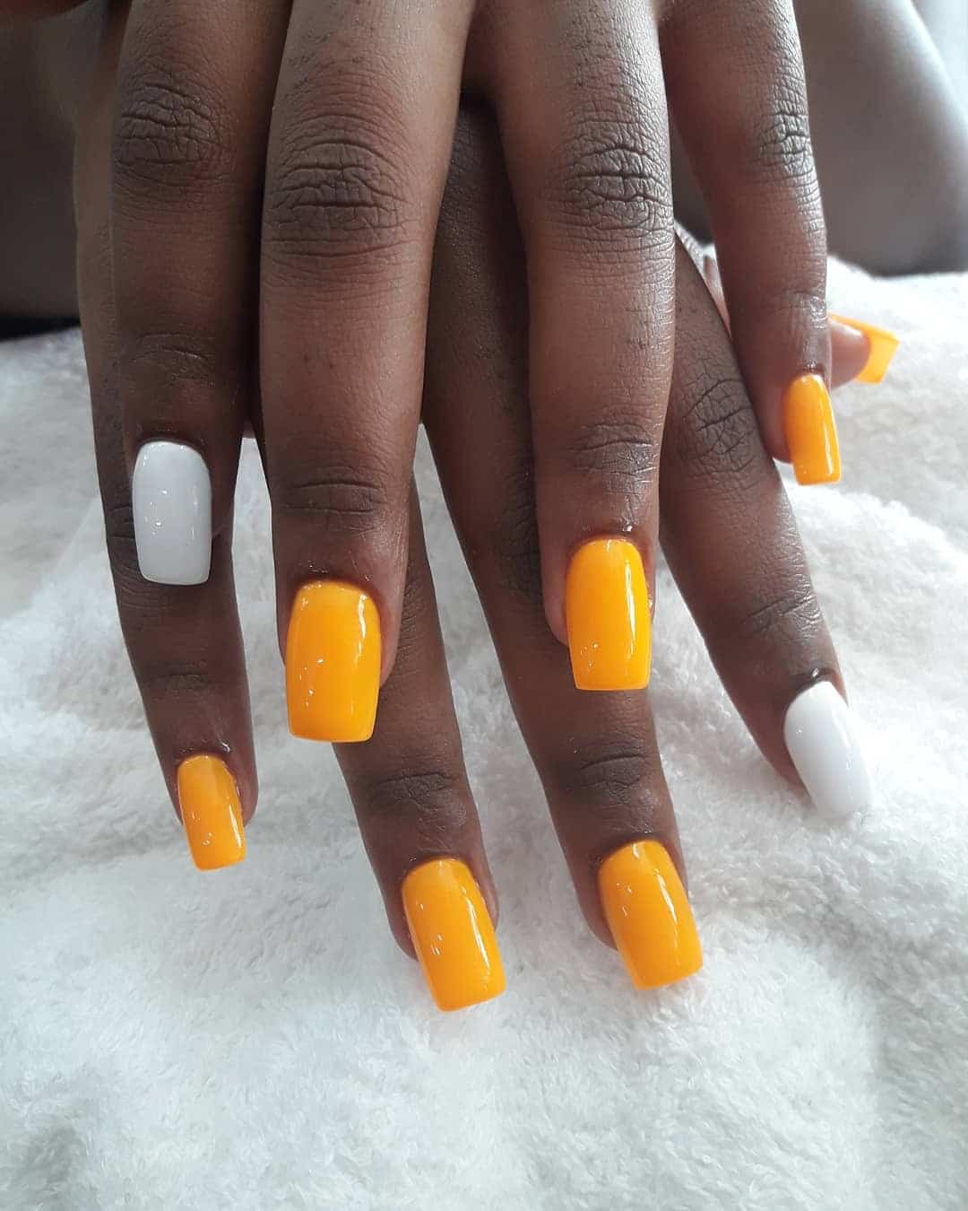 3. Sunshine Pop with White Accent - jamaican nail ideas