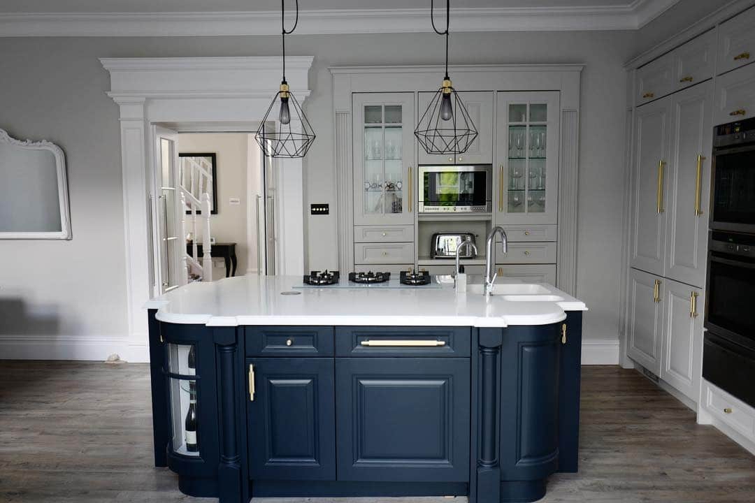 2. Classic Elegance with Navy and White Contrast - dark blue kitchen ideas