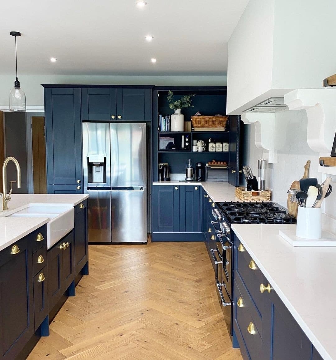 7. Classic Farmhouse in Navy and Brass - dark blue kitchen ideas