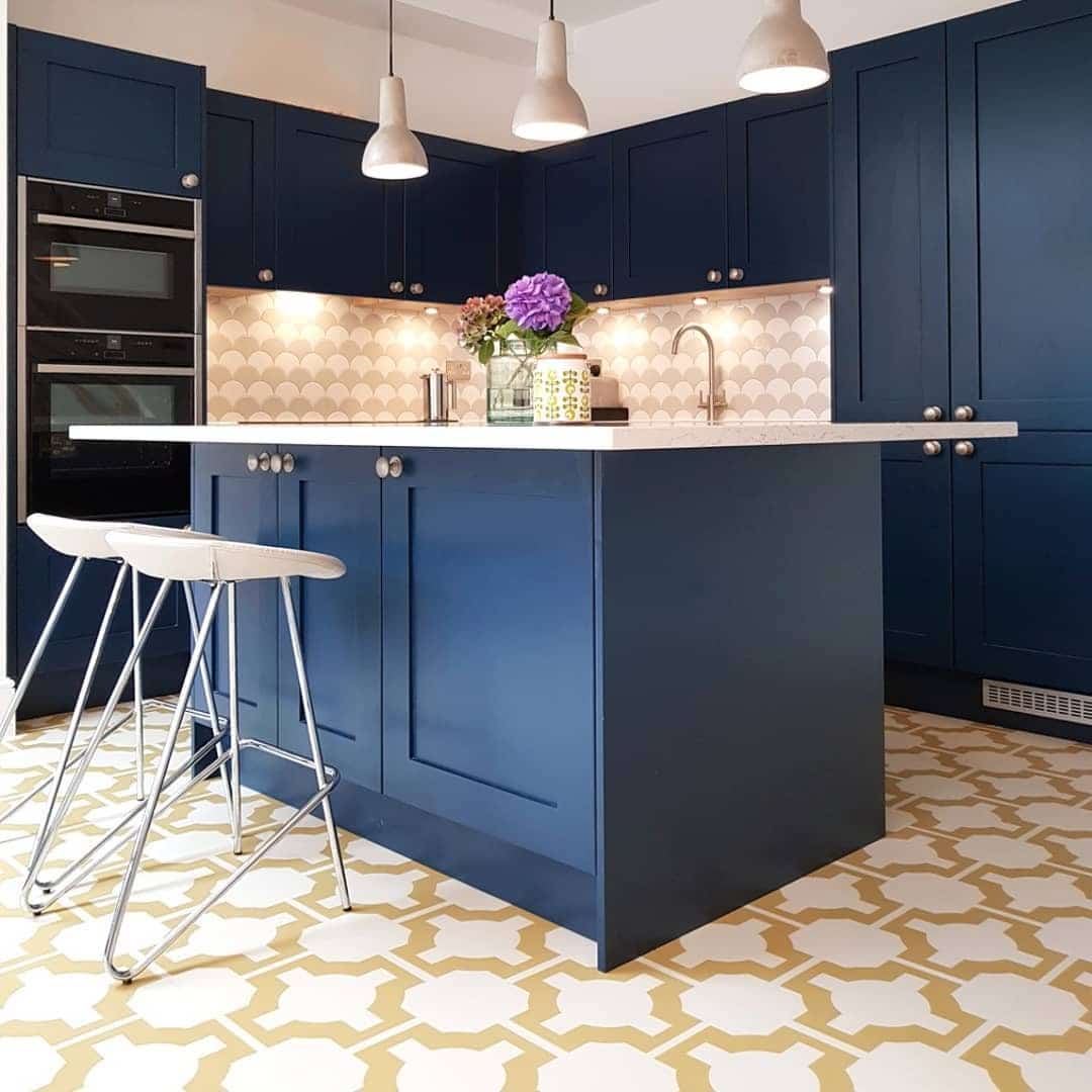 17. Playful Modern Kitchen with Navy and Patterned Tile - dark blue kitchen ideas