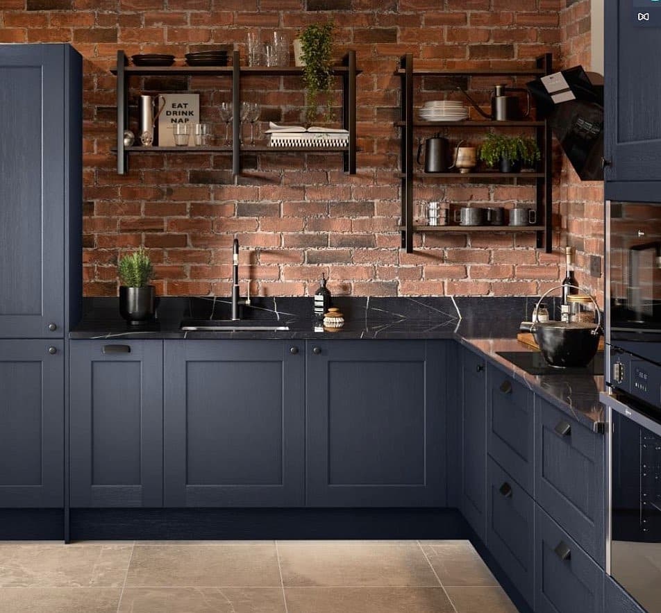 21. Industrial Edge with Navy and Brick Texture - dark blue kitchen ideas