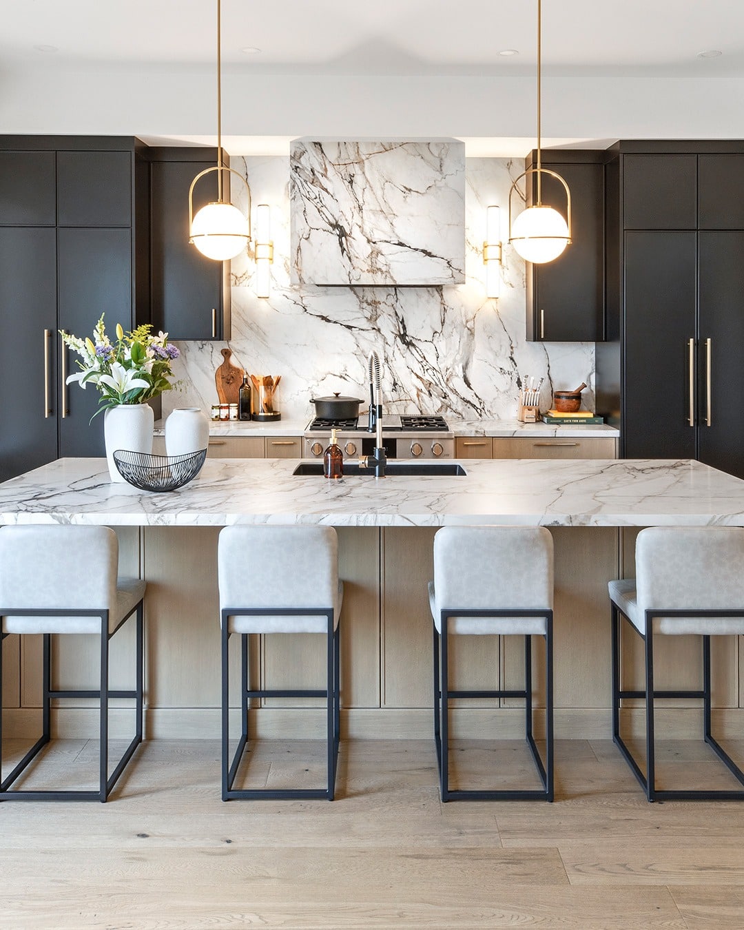 22. Marble Drama in Black and Blonde Wood - contemporary kitchen ideas