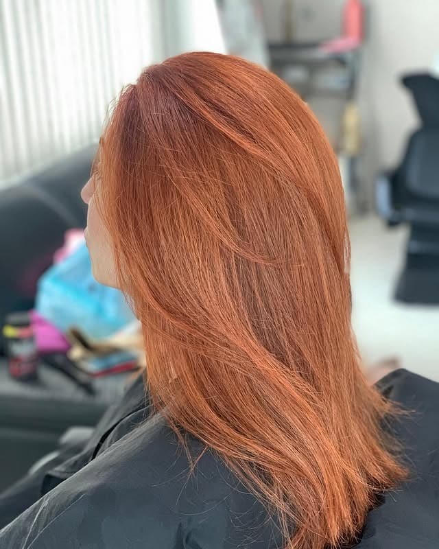 3. Smooth Light Ginger Gloss - Ginger Hair Color