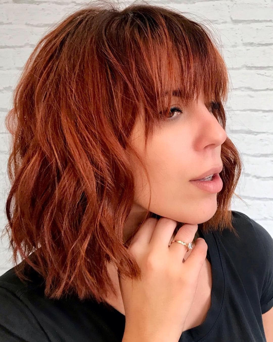 4. Textured Auburn Bob with Fringe - Ginger Hair Color