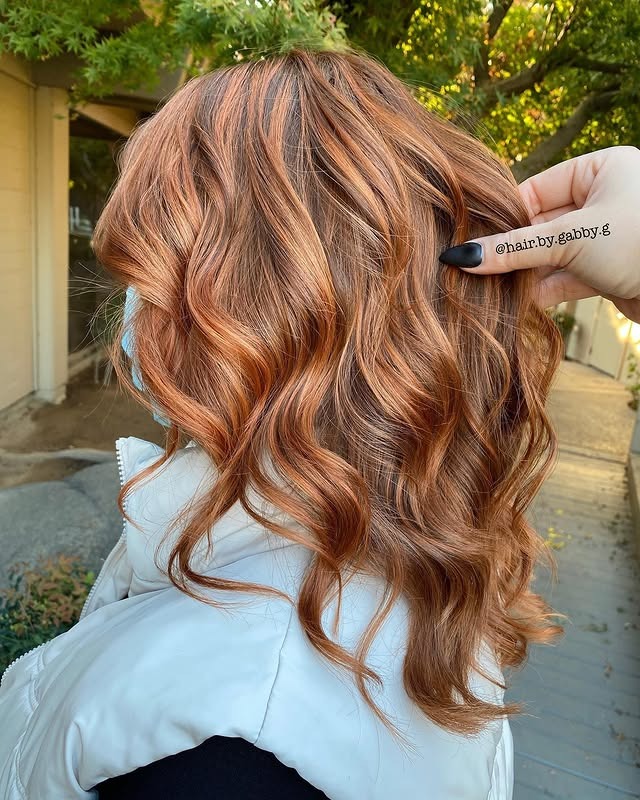9. Peachy Bronze Balayage Waves - Ginger Hair Color