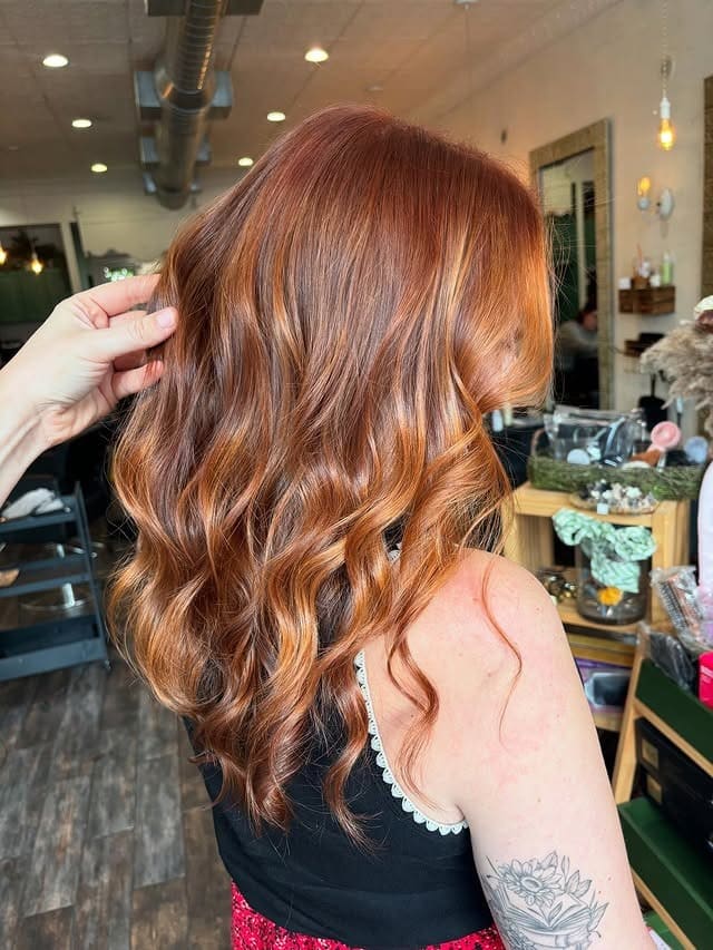 17. Amber Balayage Curls - Ginger Hair Color