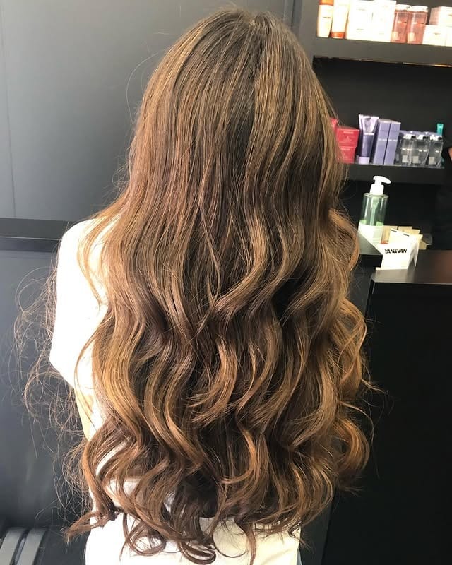 19. Amber Balayage Curls - Balayage Hair Colors