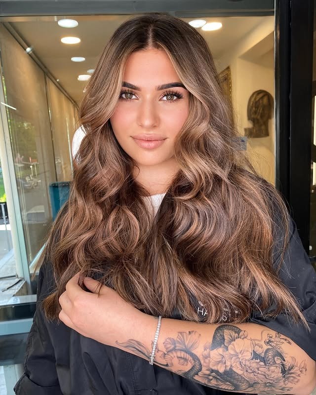 21. Soft Chestnut Balayage with Glossy Waves - Balayage Hair Colors