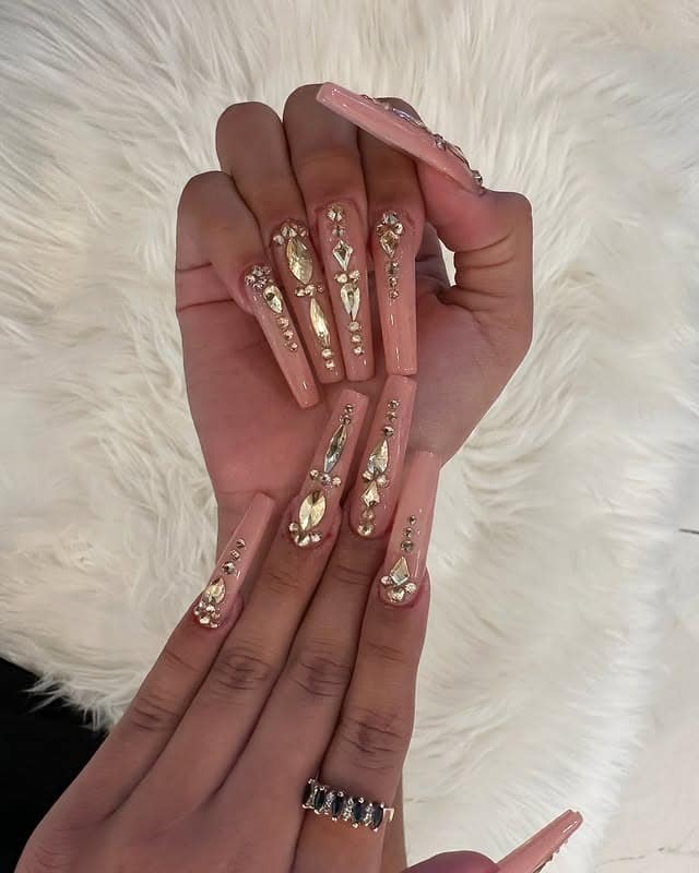 2. Blush Glam with Crystal Embellishments - long coffin nail ideas