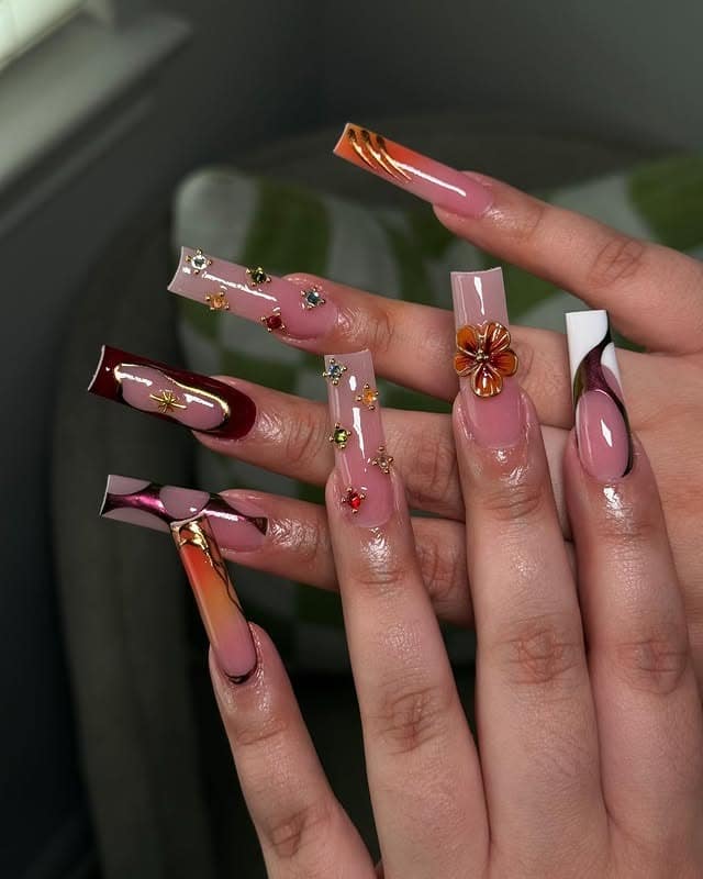 5. Autumn Gradient with Floral and Gem Details - long coffin nail ideas