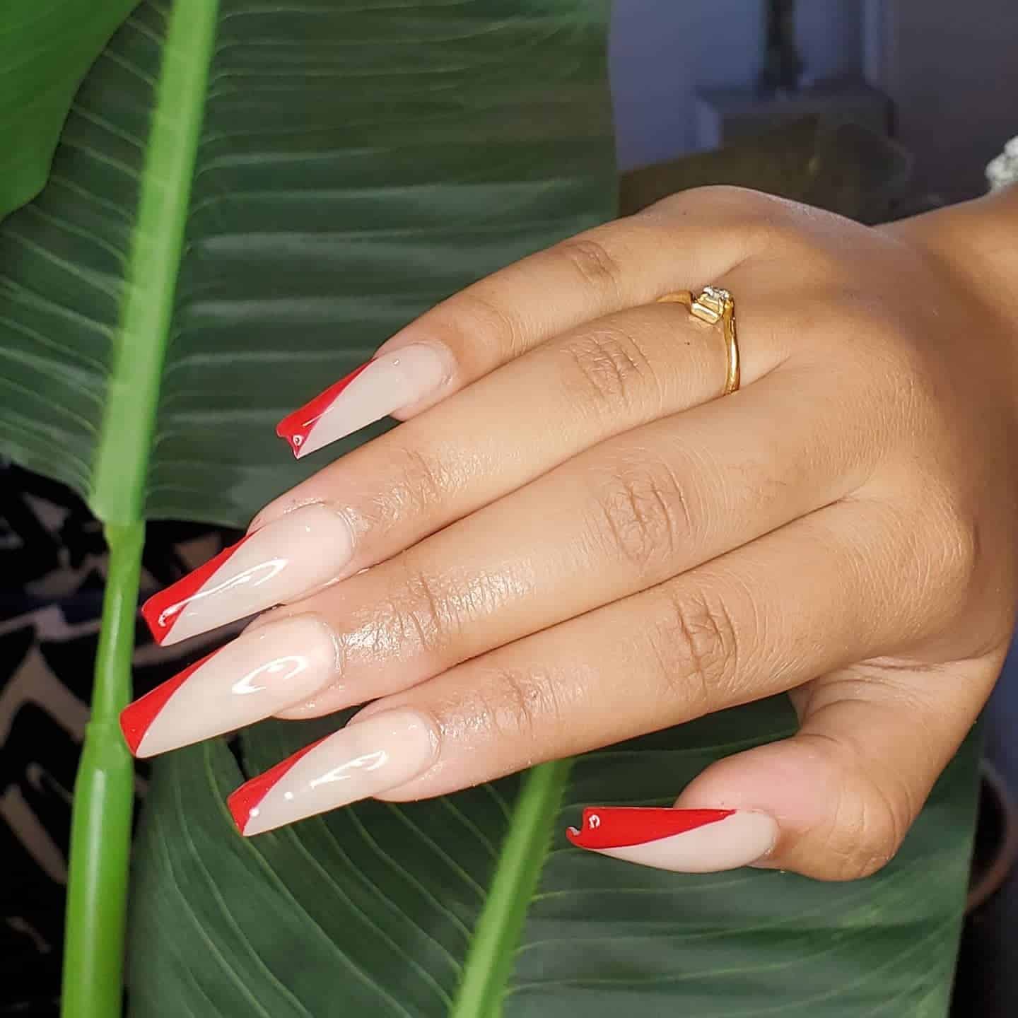6. Classic Red French Tips - long coffin nail ideas