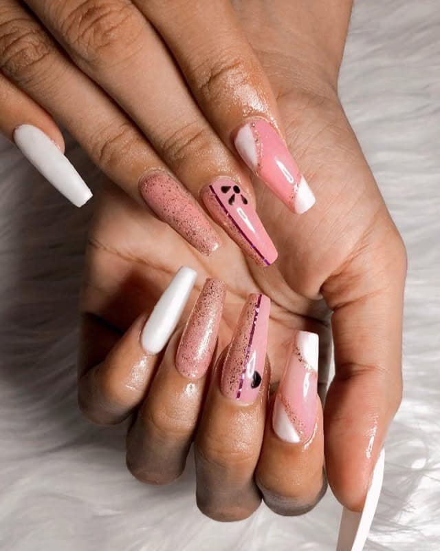 11. Blush and White Mix with Abstract Accents - long coffin nail ideas