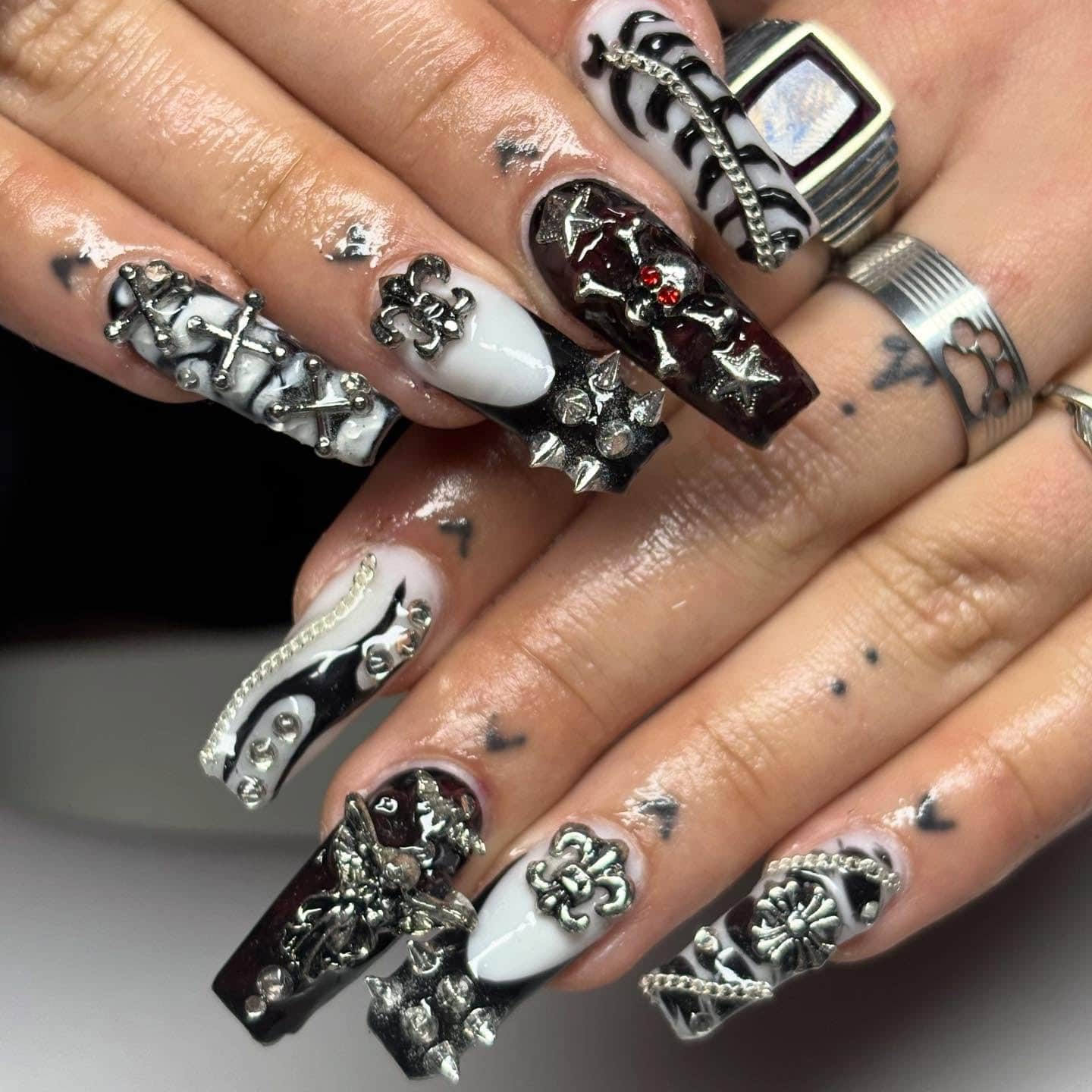 17. Gothic Armor with 3D Metal Embellishments - long coffin nail ideas