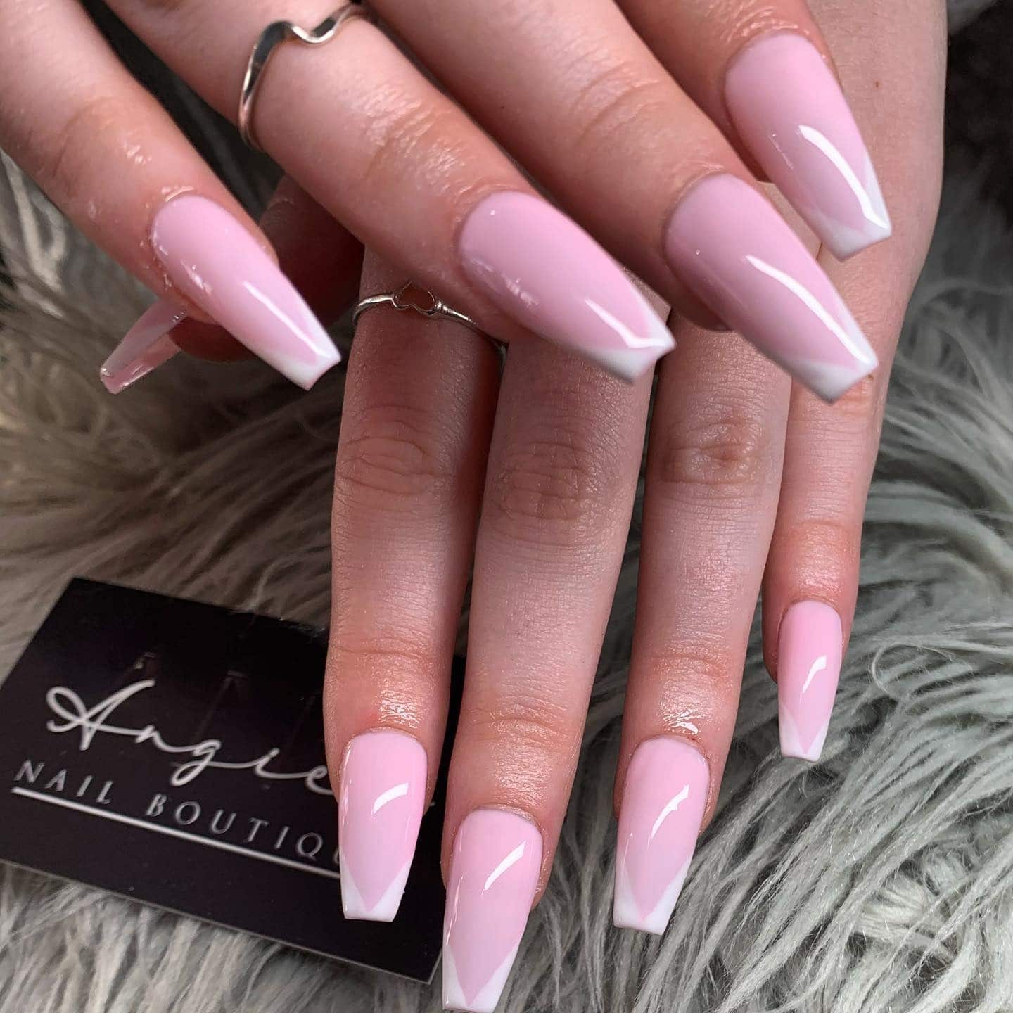 18. Classic Pink French with Sharp Angles - long coffin nail ideas