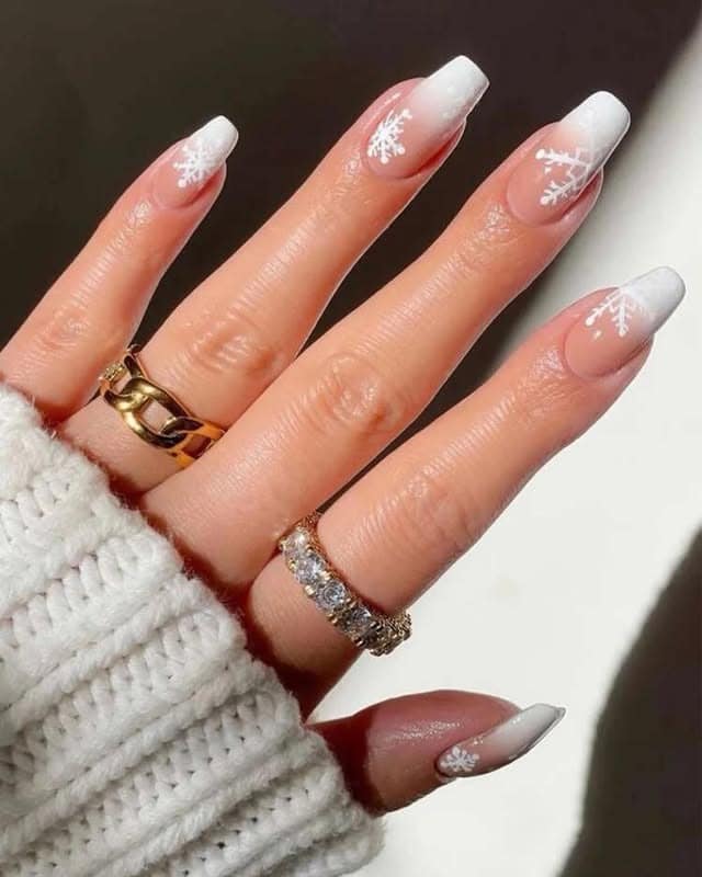 19. Snowflake French Tips in White and Nude - long coffin nail ideas
