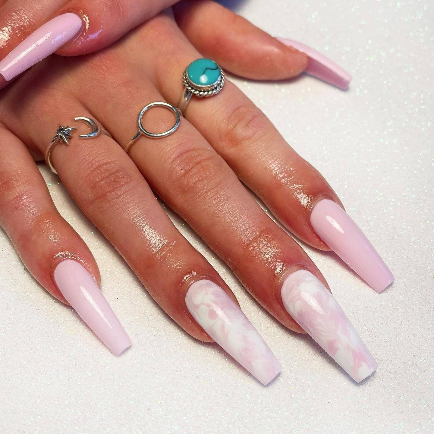 20. Soft Pastel Marble with Glossy Finish - long coffin nail ideas