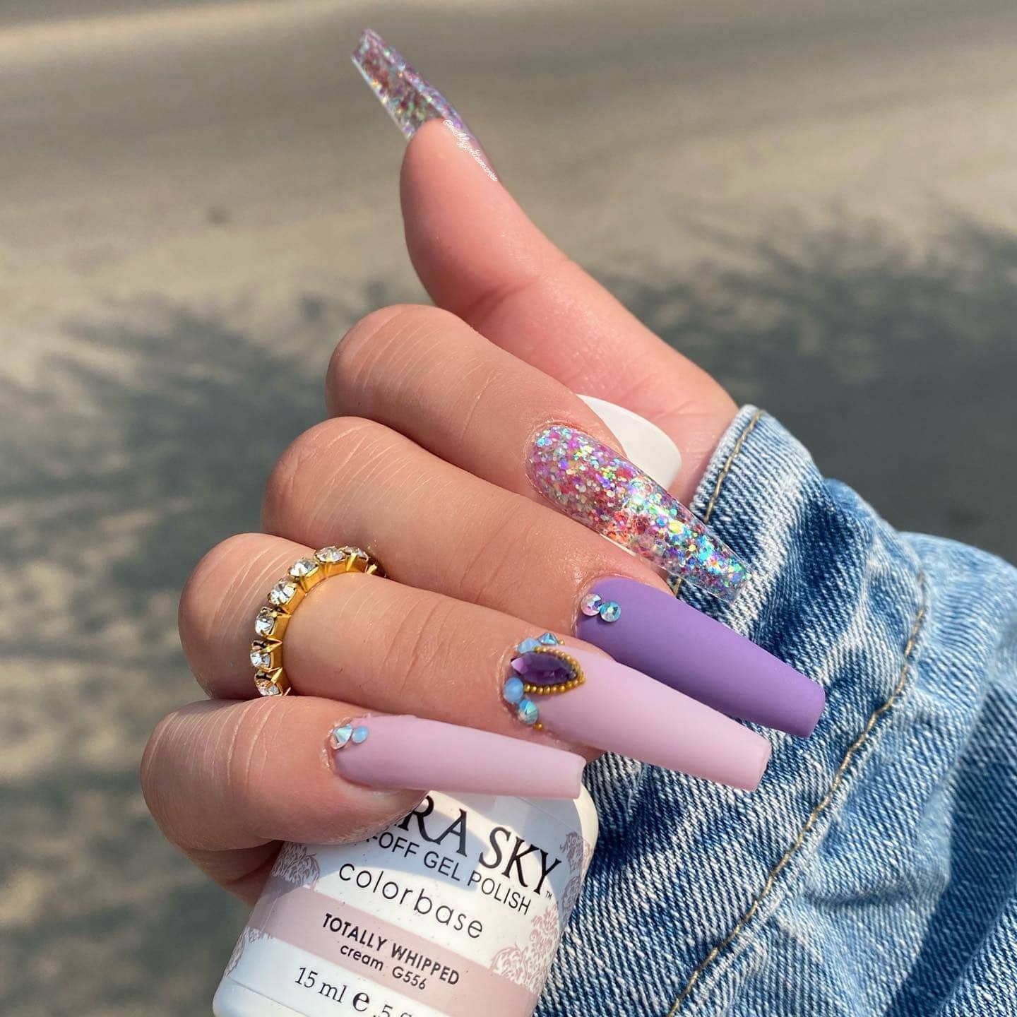 21. Pastel Lilac and Pink Mix with Glitter Glam - long coffin nail ideas
