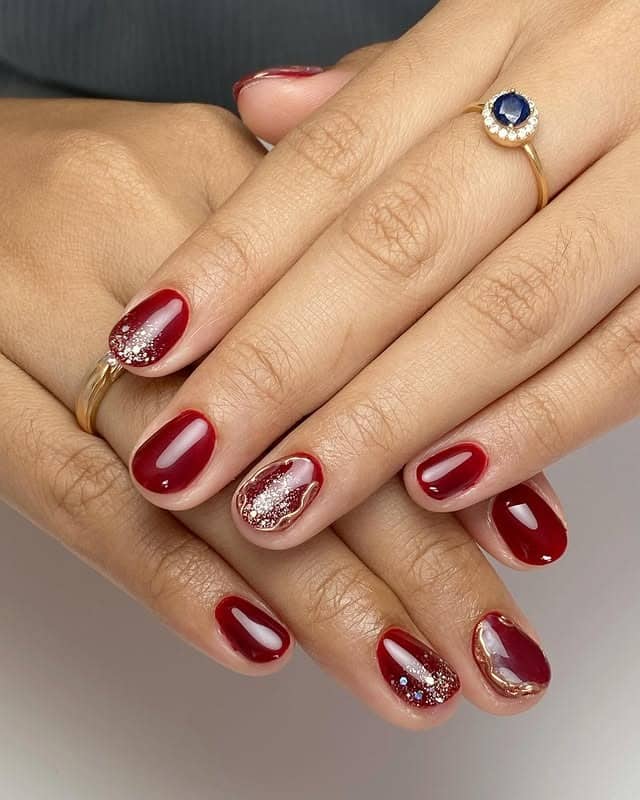 2. Ruby Luxe Sparkle - maroon and gold nail ideas