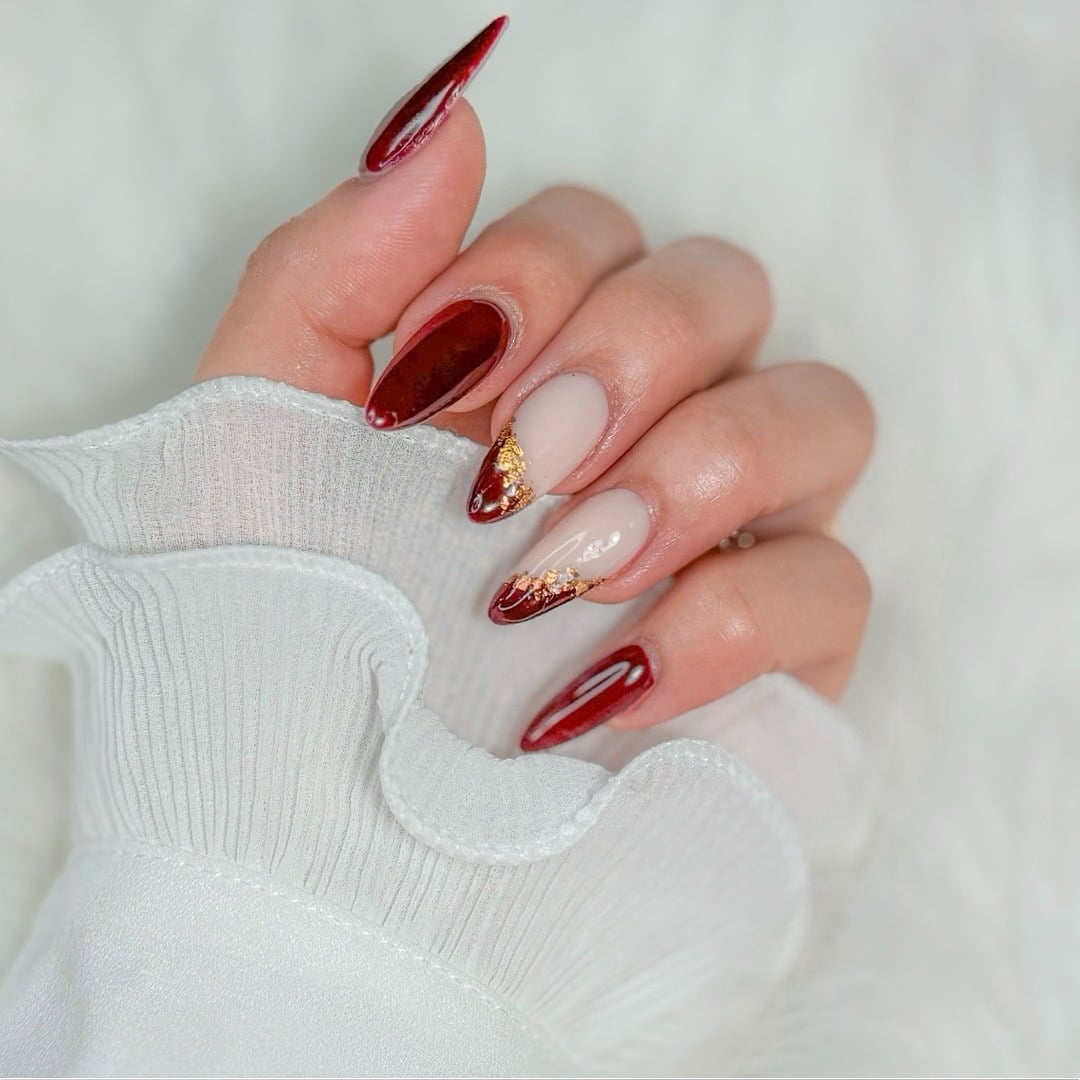 14. Crimson French with Gold Foil Detail - maroon and gold nail ideas