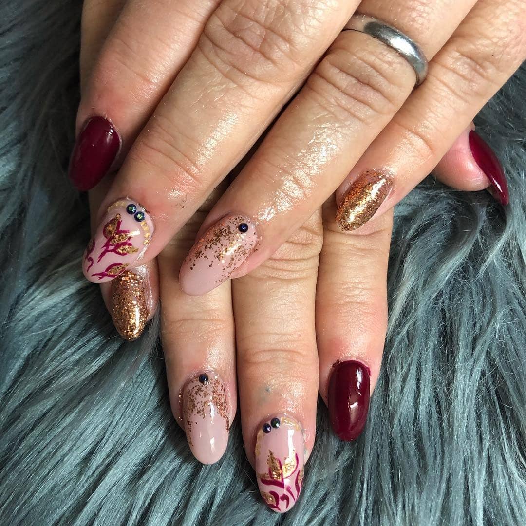 16. Autumn Radiance Mix - maroon and gold nail ideas