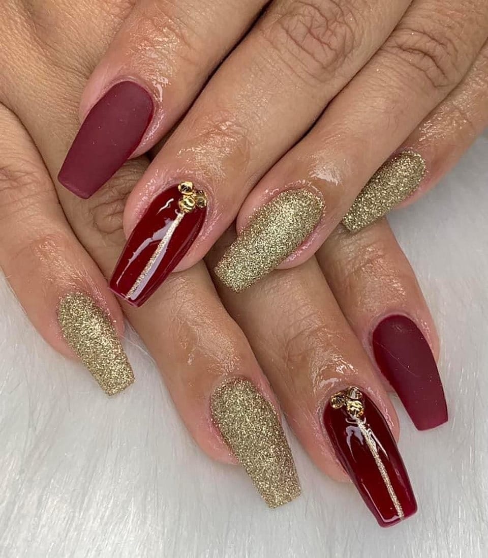 18. Velvet Gold Duo - maroon and gold nail ideas