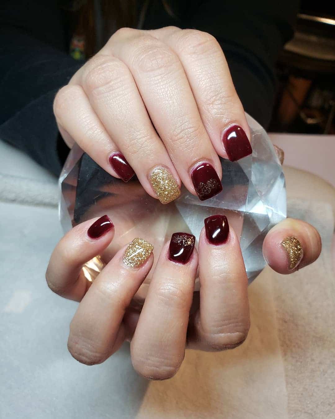19. Rich Wine and Gold Fusion - maroon and gold nail ideas