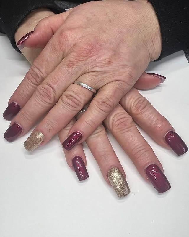 21. Classic Wine and Gold Balance - maroon and gold nail ideas
