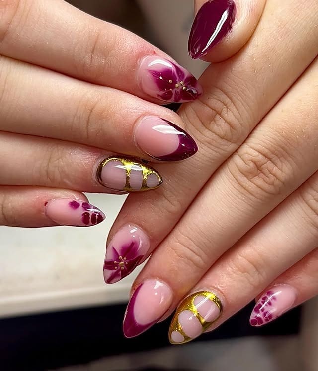 22. Artful Maroon Florals with Gold Detailing - maroon and gold nail ideas