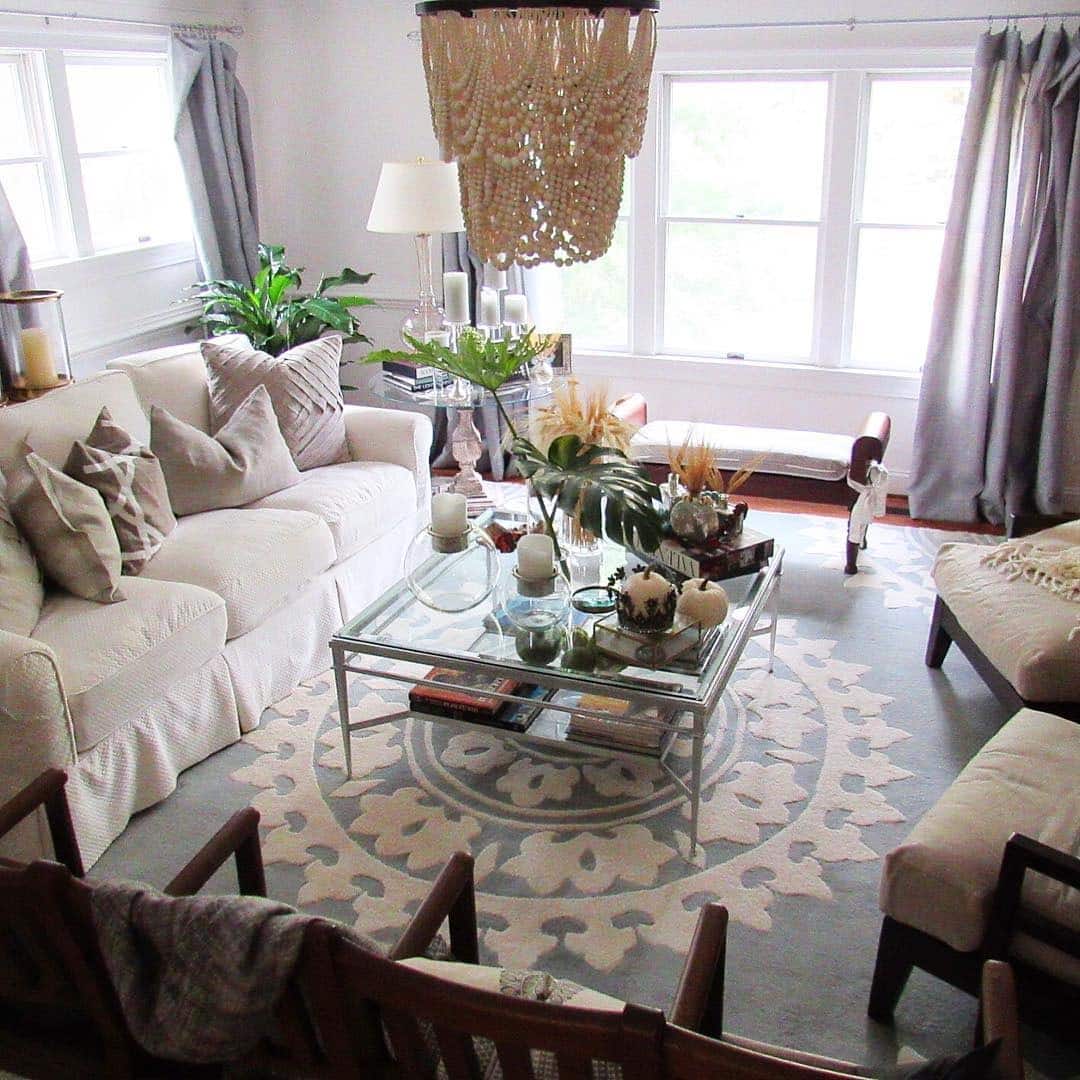 10. Refined Neutral Haven with Soft Autumn Accents - fall living room decor ideas