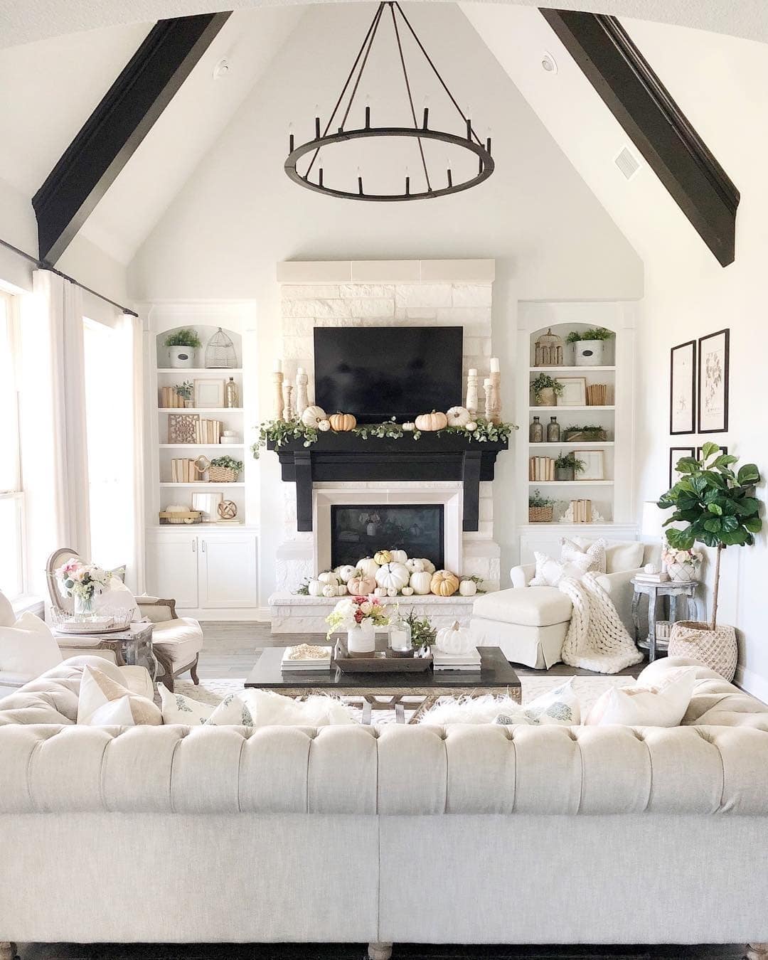 14. Soft White Farmhouse with Pumpkin Accents - fall living room decor ideas