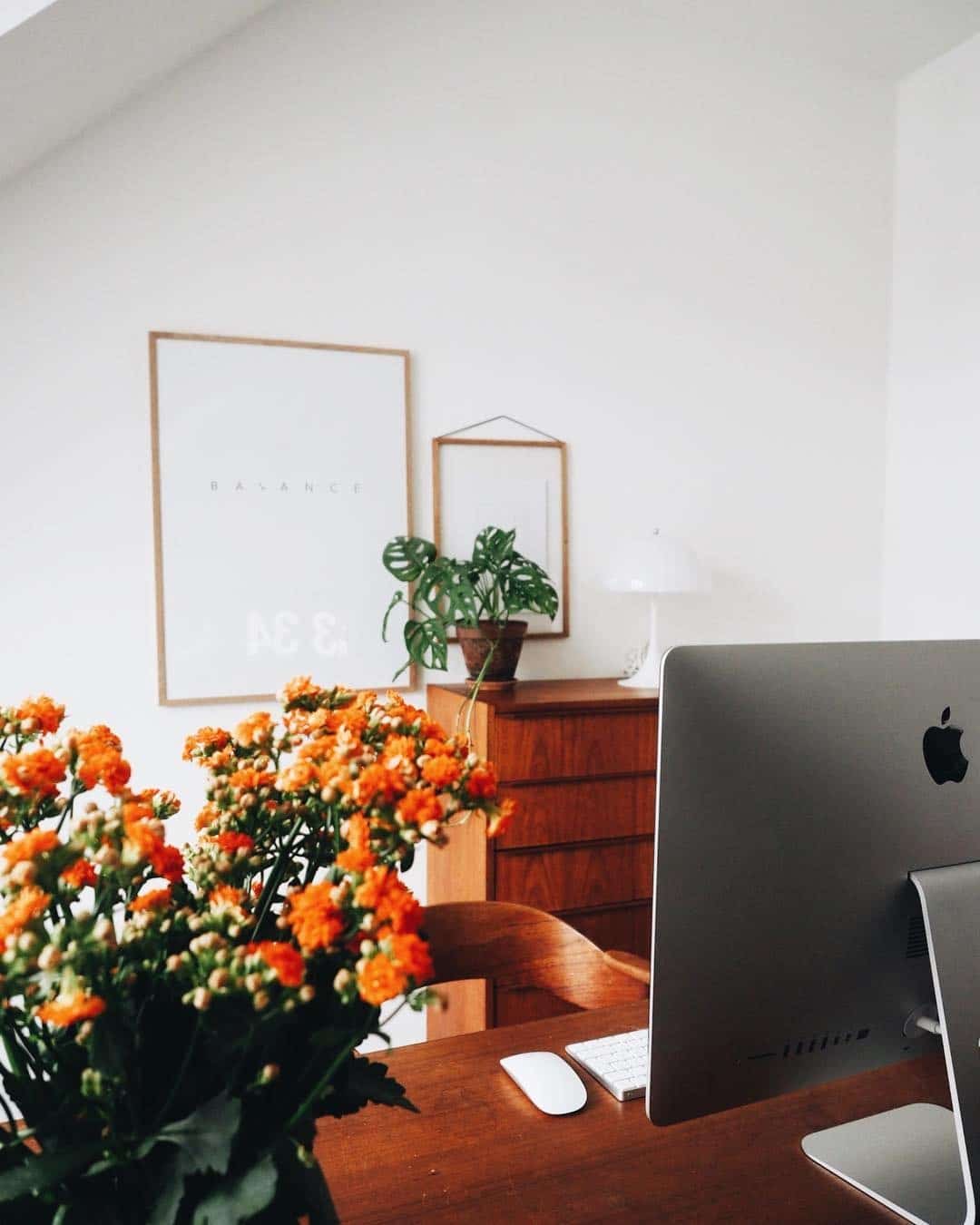 17. Organic Simplicity with Floral Orange Touches - orange office ideas