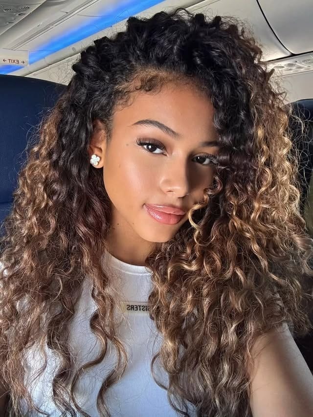 1. Honey Brunette Voluminous Curls - Curly Hairstyles