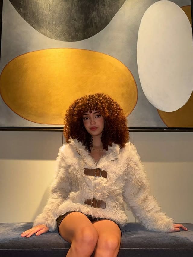 9. Auburn Curly Fringe Cut - Curly Hairstyles