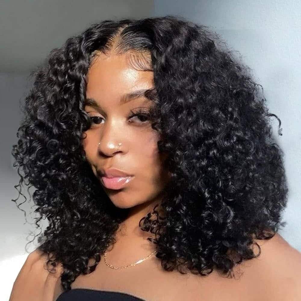 21. Defined Jet Black Curly Lob - Curly Hairstyles