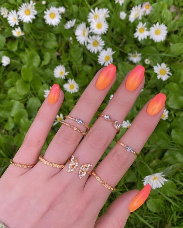 5. Sunset Ombre Elegance - neon orange nail ideas