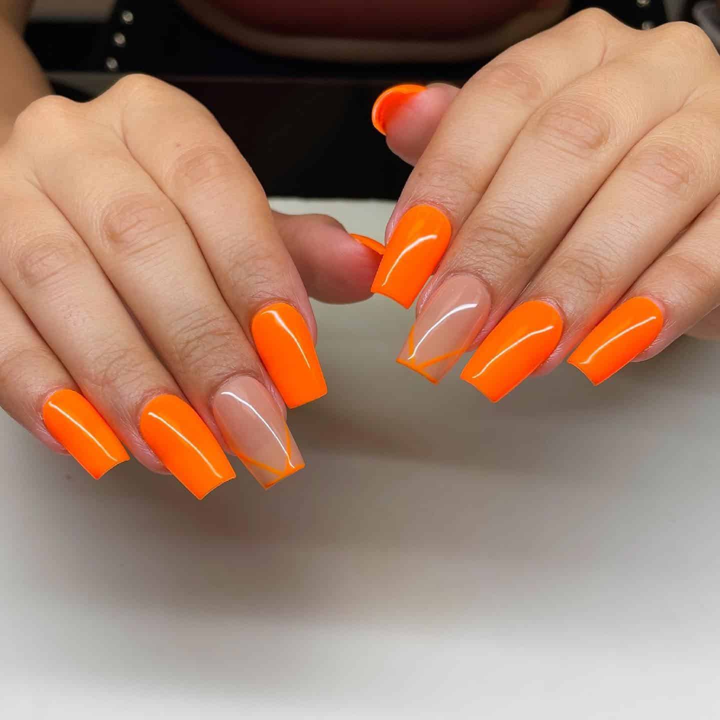 6. Citrus Glow Geometry - neon orange nail ideas
