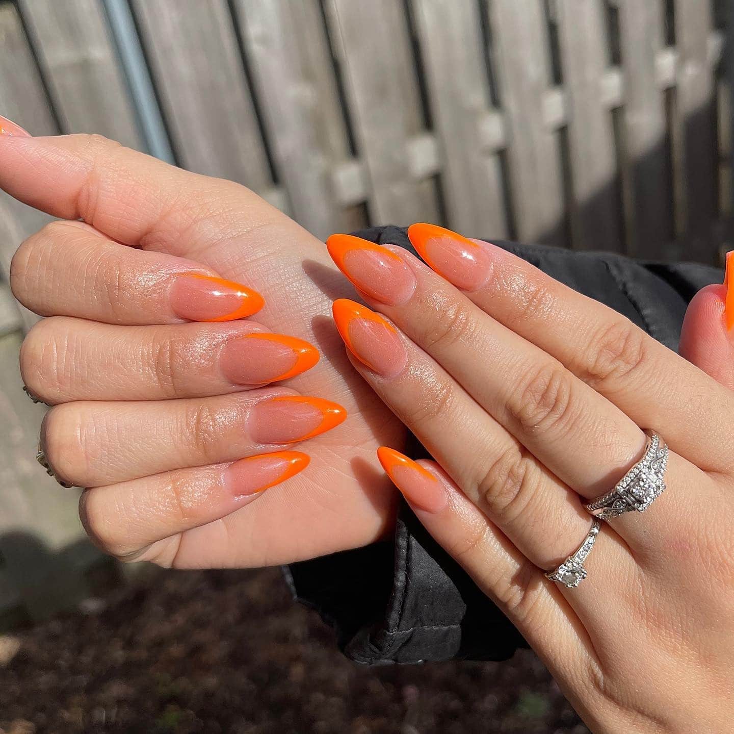 8. Pointed Neon Precision - neon orange nail ideas