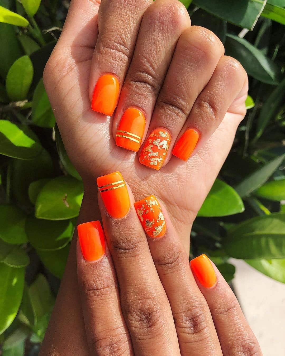 17. Golden Accent Neon Nails - neon orange nail ideas