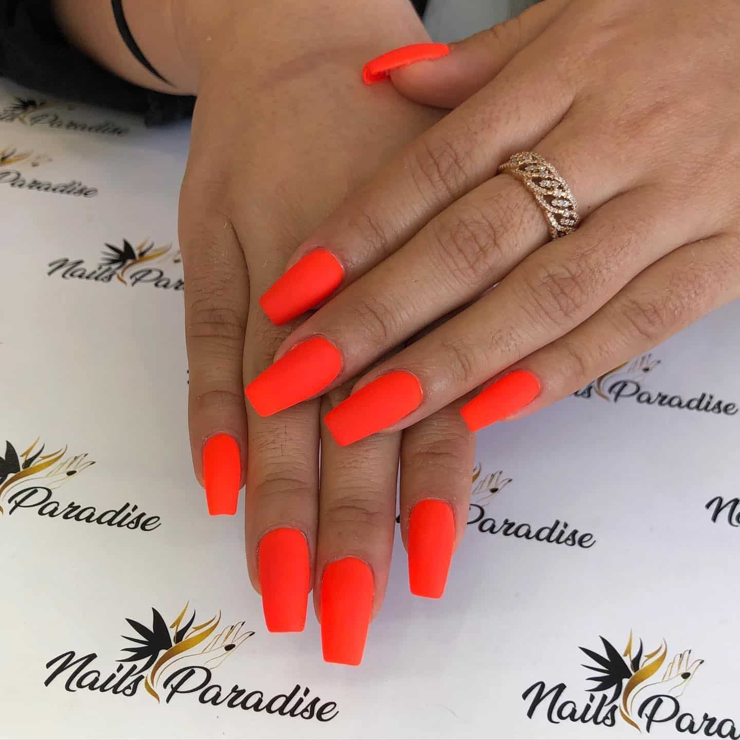 18. Matte Neon Orange Elegance - neon orange nail ideas